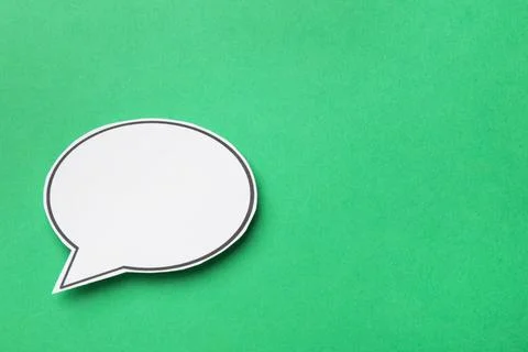 Blank speech bubble on green background. Space for text Stock Photos