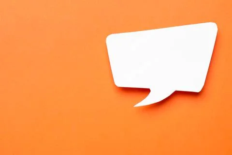 Blank speech bubble on orange background, top view. Space for text Stock Photos
