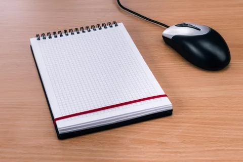 Blank Spiral Notebook and Computer Mouse Stock Photos