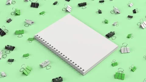 Blank spiral notebook with black, white and green binder clips on green table Stock Illustration