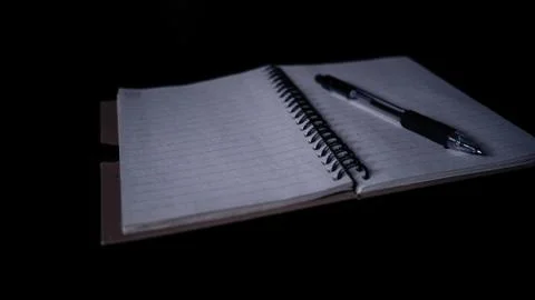 Blank spire notepad with pen Stock Photos