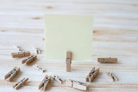 Blank Square Note Surrounded By Laundry Clips Showing New Meaning. Empty Pi.. Stock Photos