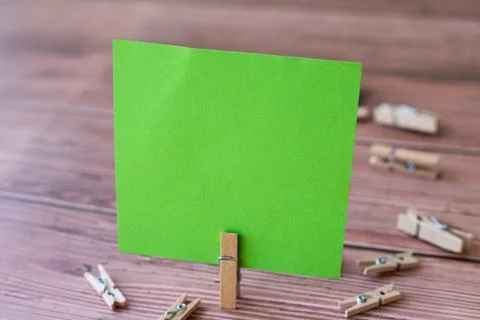 Blank Square Note Surrounded By Laundry Clips Showing New Meaning. Empty Pi.. Stock Photos