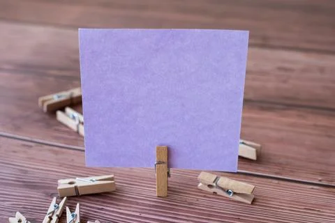 Blank Square Note Surrounded By Laundry Clips Showing New Meaning. Empty Pi.. Stock Photos