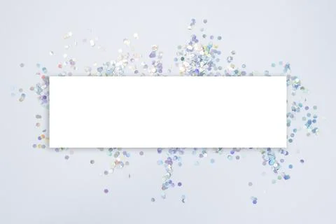 Blank square rectangular card and silver confetti. Template Layout. Top view Stock Photos