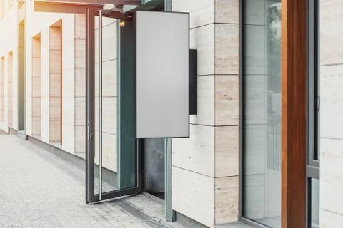 Blank square store signboard. Empty shop lightbox on the wall. 3d rendering. Illustrazione stock