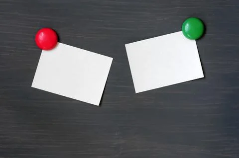 Blank stick note on a blackboard Stock Photos
