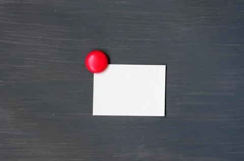 Blank stick note on a blackboard Stock Photos