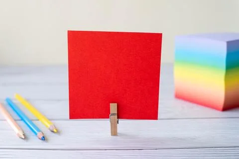 Blank Sticky Note With Laundry Clip Stack Of Colorful Paper Pen Placed On T.. Stock Photos