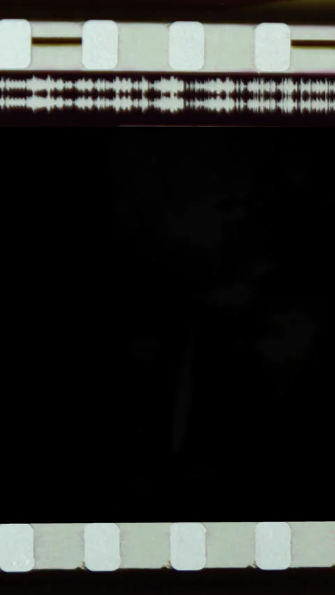 Blank super 8 film frames passing by Stock-Footage 308394513