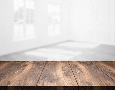 Blank table top in front of blurry room - Illustration Illustrazione stock