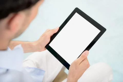 Blank tablet computer in hands Stock Photos