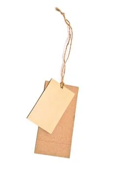 Blank tag tied with brown string. Blank tag tied with brown string. Copyri... Stock Photos