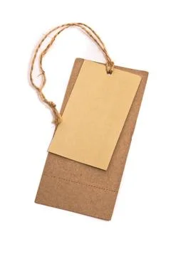 Blank tag tied with brown string. Blank tag tied with brown string. Copyri... Stock Photos