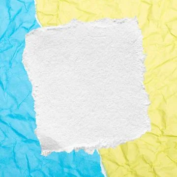 Blank Torn White Paper on Split Blue and Yellow Crumpled Background Stock Photos