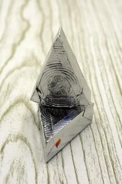 Blank Triangular Processed Cheese With Nol Lable Isolated on White Background Stockfoto's