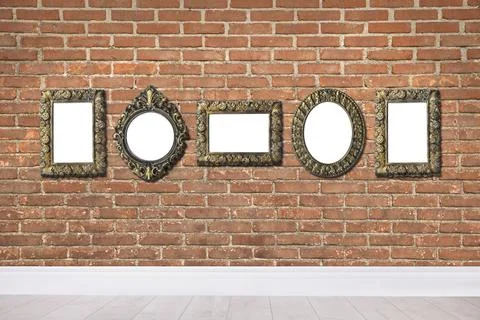 Blank vintage frames hanging on brick wall. Mockup for design Foto stock