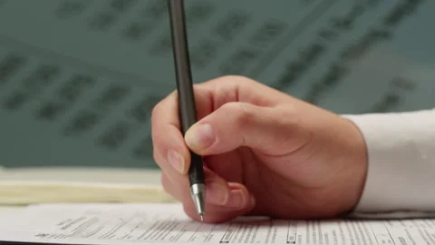 Blank W-9 and Form W8-BEN or 8W U.S. individual income tax return and Internal Stock-Footage 265909949
