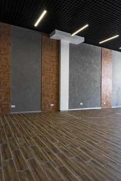 Blank walls in empty loft style industrial office Stock Photos