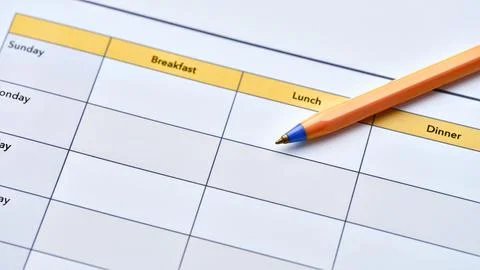 A blank weekly meal planner template. Stock Photos