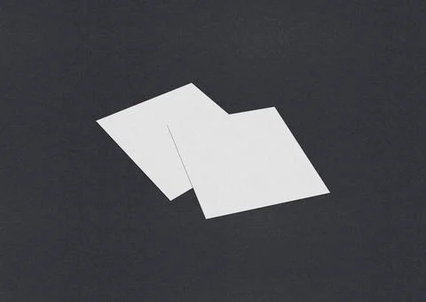 Blank white Business card mockup stacks at grey textured paper background. Stock Photos