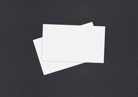 Blank white Business card mockup stacks at grey textured paper background. Foto stock