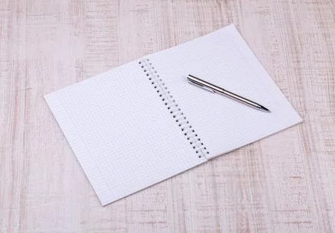 Blank white notebook on the desk Stock Photos