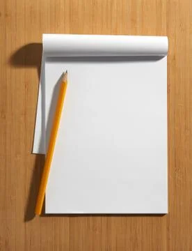 Blank white notepad with a pencil Stock Photos
