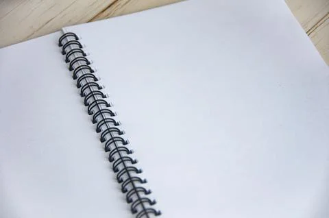 Blank white notepad with space customizable for text or ideas. Stock Photos