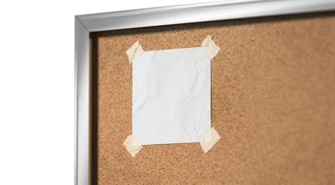 Blank white paper note taped cork-board mockup, depth of field Illustrazione stock