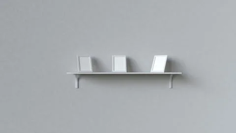 Blank white photo frames standing on shelf Illustrazione stock