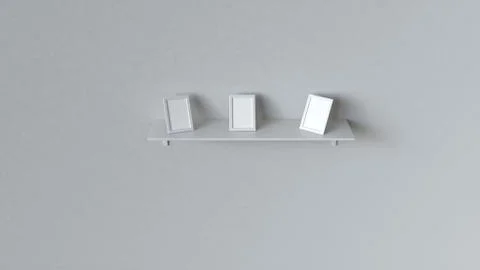 Blank white photo frames standing on shelf Stock Illustration