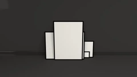 Blank white posters in black frames standing on the floor Illustrazione stock