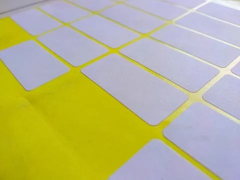 Blank white rectangular adhesive stickers sheet with missing label 写真素材