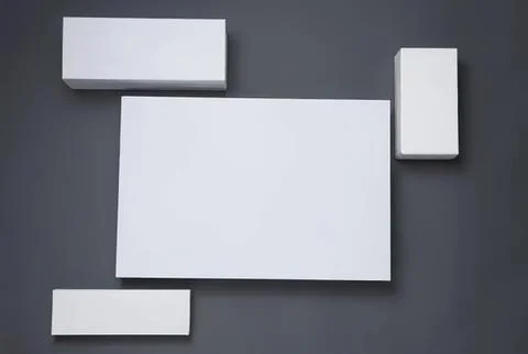 Blank white rectangular and square blocks on gray background Stock Photos