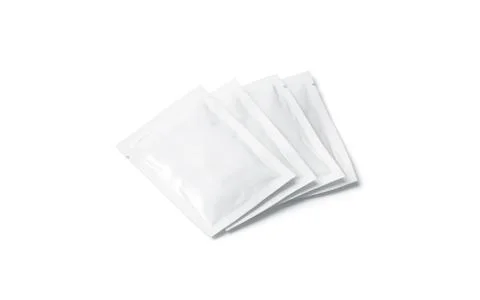 Blank white sachet packets stack mock up, isolated, side view Foto stock