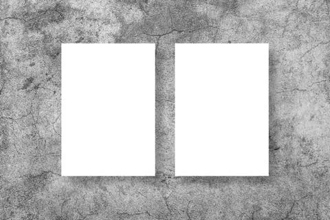 Blank white vertical rectangle poster mock up in white frame on gray background Foto stock