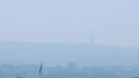 A blanket of smoke from a local forest fire fills the sky Vídeo Stock 283673878