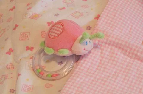 Blankets and rattle-bug Stock-Fotos