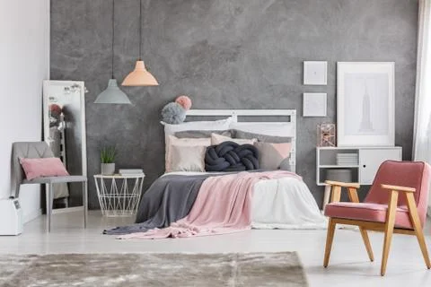 Blankets falling off the bed Stock Photos