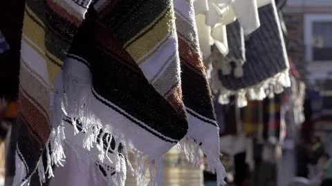 Blankets at a Mexican market with a focus pull. Stock Footage 84787115
