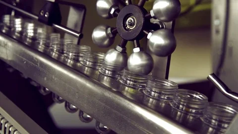 Blanks for plastic bottles on the conveyor Stockbeeldmateriaal 73834976