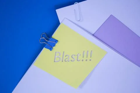 Blast. Text on adhesive note paper. Event, celebration reminder message. Stock Photos