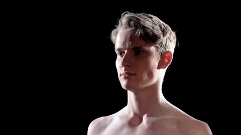 A blast wave with a cloud of dust covers a man Vídeos de archivo 74774416