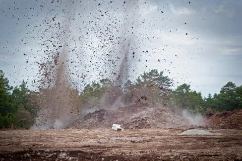 Blasting limestone in a quarry Stock Photos