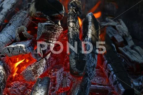 Blaze of bonfire wood fire flame spires in fireplace Stock Photos
