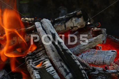Blaze of bonfire wood fire flame spires in fireplace Stock Photos
