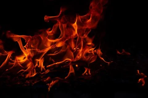 Blaze burning fire flame on art texture background. Stockfoto's