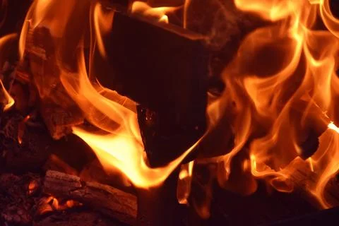 Blaze fire flame texture background. Fire sparks background. Abstract fire .. Stock Photos