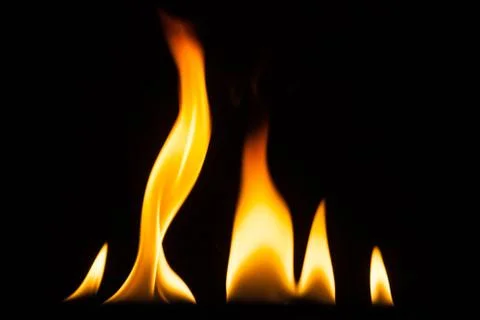 Blaze of fire isolated on black ground Stock Photos